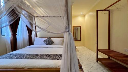 Gambar di galeri bagi Ultra HomeStay di Arusha