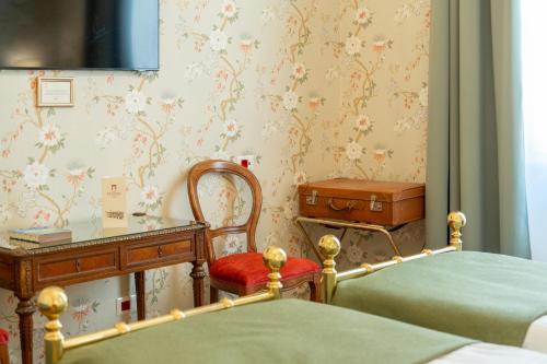 Postel nebo postele na pokoji v ubytování Hotel Pendini