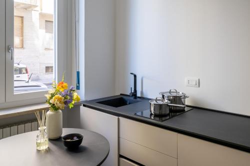 Кухня или мини-кухня в La Casa del Bersagliere - APARTMENT
