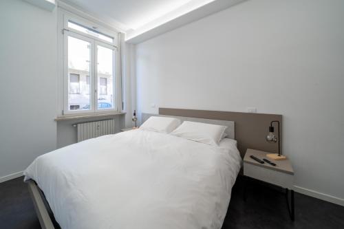 Кровать или кровати в номере La Casa del Bersagliere - APARTMENT