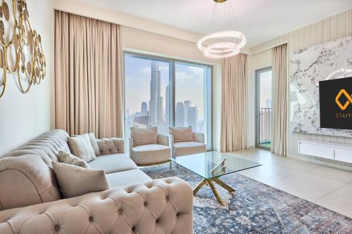 Luxury 4 Bedroom High-Floor Apartment, Spectacular Burj Khalifa & Fountain Views, Steps Away from Dubai Mall - Downtown Dubai by Stayfinity