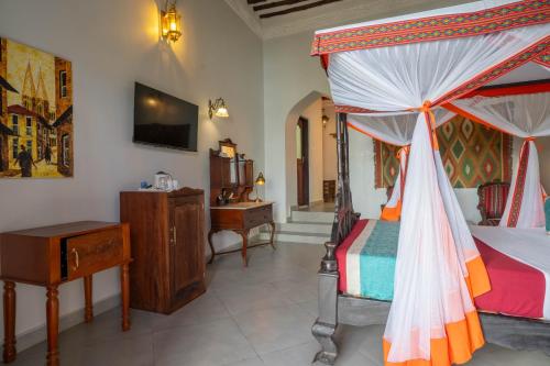 TV o dispositivi per l'intrattenimento presso Mizingani Seafront Hotel