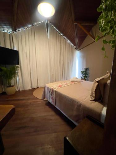 Katil atau katil-katil dalam bilik di POUSADA APOEMA PETRÓPOLIS-Rj