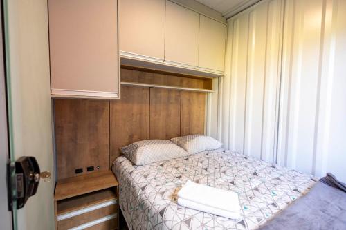 Postel nebo postele na pokoji v ubytování Studio 9 completo confortável no Ahú 1º andar