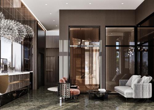 a living room with a couch and a chair at Luminoso Boutique Hotel in Budva