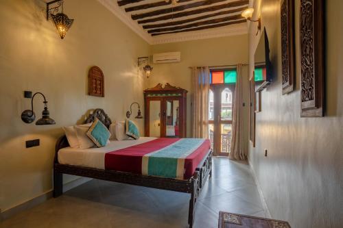 Letto o letti in una camera di Mizingani Seafront Hotel