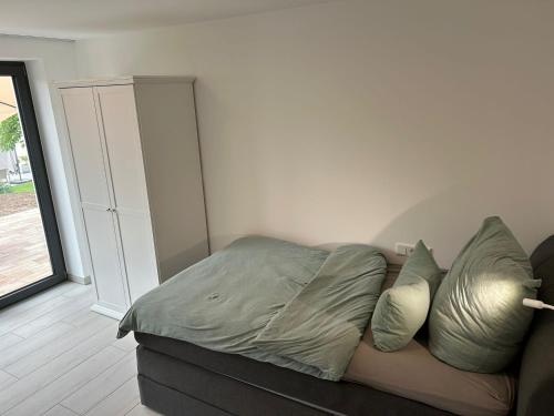 Ein Bett oder Betten in einem Zimmer der Unterkunft MainSpessartBlick