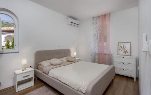 Katil atau katil-katil dalam bilik di Apartman Lea - Villa Oleander