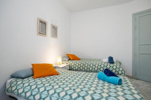 Posteľ alebo postele v izbe v ubytovaní Casa Atalaya