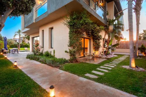 Κήπος έξω από το Villa Argana moderne et luxueuse piscine chauffée