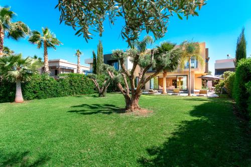 Κήπος έξω από το Villa Argana moderne et luxueuse piscine chauffée
