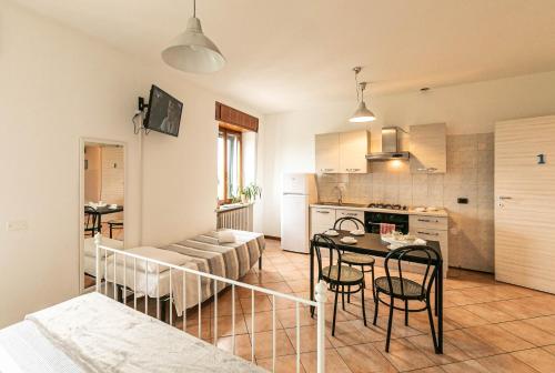 Kuchyň nebo kuchyňský kout v ubytování InGarda Rooms