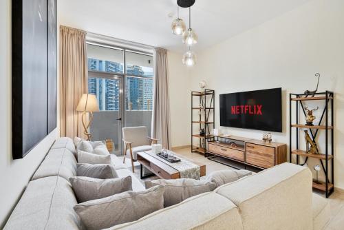 Modern 2BR with Private Terrace, Pool and Gym Access