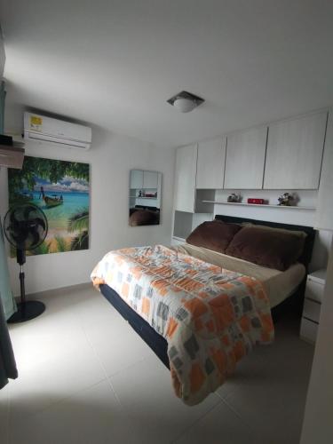 Ένα ή περισσότερα κρεβάτια σε δωμάτιο στο Sol y Brisa 811