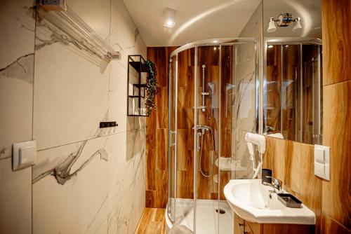 Et badeværelse på Dom Gościnny Dana