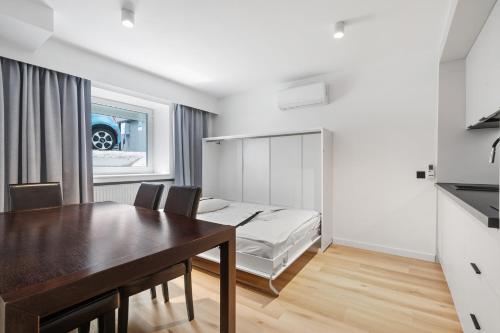 Katil atau katil-katil dalam bilik di Apartamenty Modra Warszawa