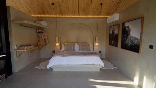Giường trong phòng chung tại Ashanté Boutique Retreat