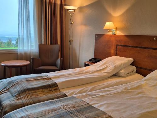Ένα ή περισσότερα κρεβάτια σε δωμάτιο στο Westland Hotel
