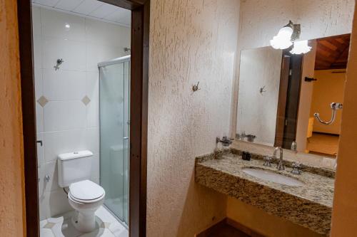 Koupelna v ubytování Varshana Hotel