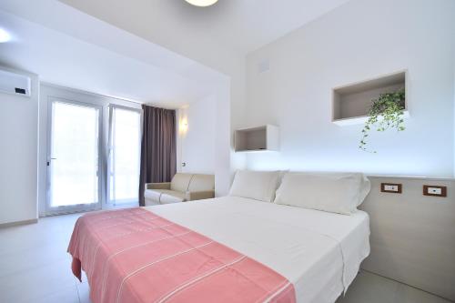 Llit o llits en una habitació de Hotel Di Giovanni