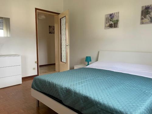 Postel nebo postele na pokoji v ubytování La Casa Nel Verde
