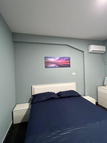 Ліжко або ліжка в номері Sunset Apartment