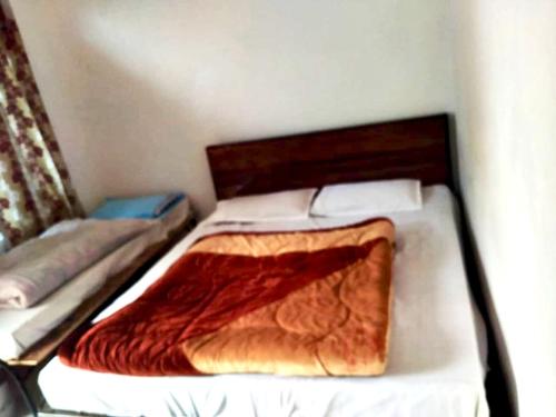 Cama o camas de una habitación en Hotel Yamdagni Rishi
