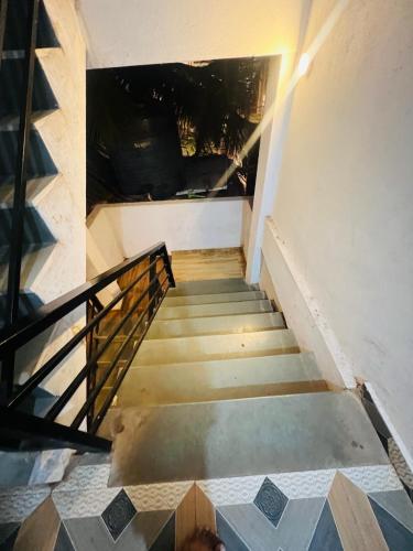 a stairway leading up to the top of a building at The Nomy in Calangute