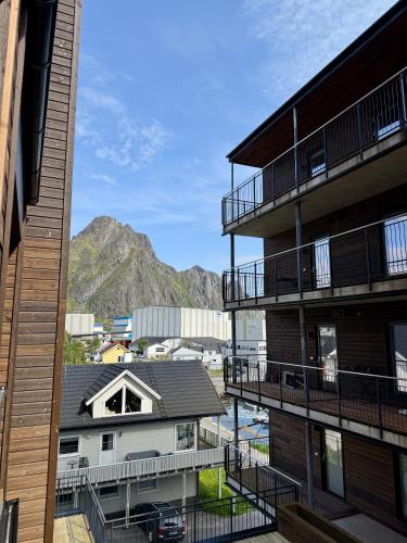 a view of the mountains from a building at Modern apartment with balcony in the center of Svolvær in Svolvær