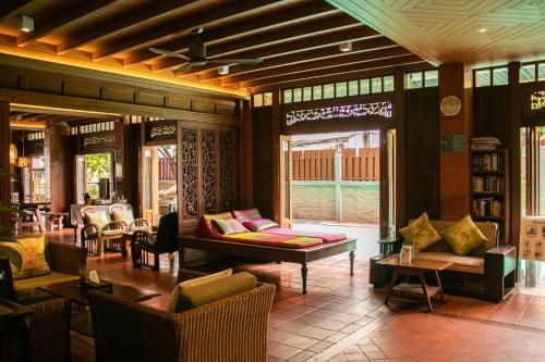 Χώρος καθιστικού στο Lamphu Tree House Boutique Hotel