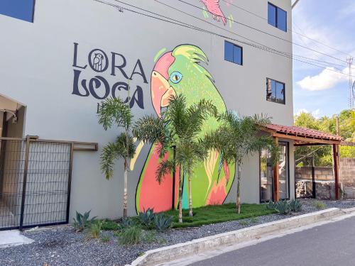 a mural of an elephant on the side of a building at Lora Loca Inn in El Zonte