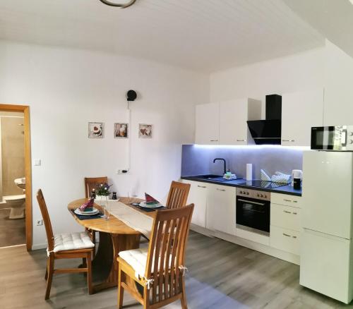 Η κουζίνα ή μικρή κουζίνα στο Diemeltal Lodge Appartment III