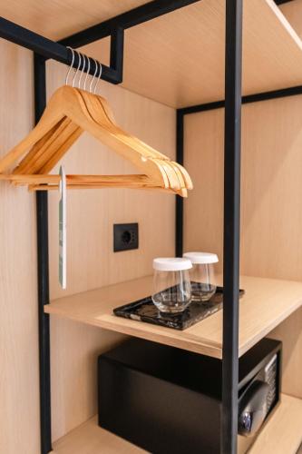 a small kitchen in a tiny house at Austin Boutique Hotel in Sarandë