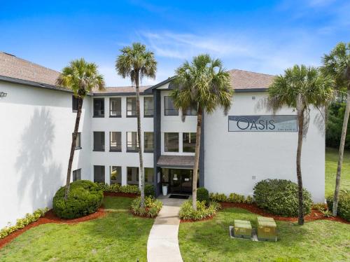 Κήπος έξω από το Oasis 316 - Palm Paradise