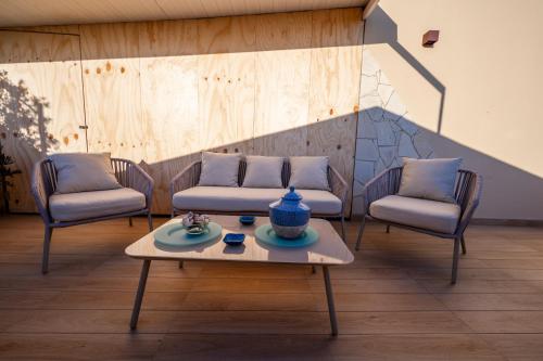 Coin salon dans l'établissement Panorama Suites Noto - Adults Only