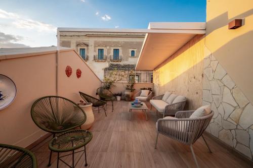 Coin salon dans l'établissement Panorama Suites Noto - Adults Only