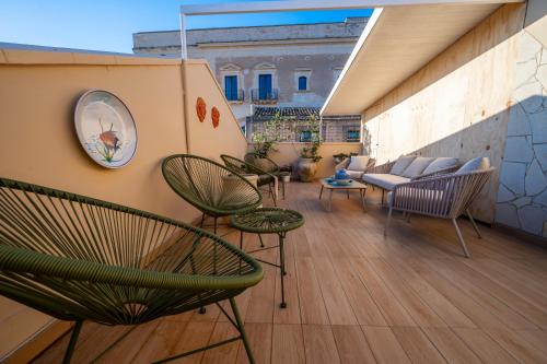 Coin salon dans l'établissement Panorama Suites Noto - Adults Only