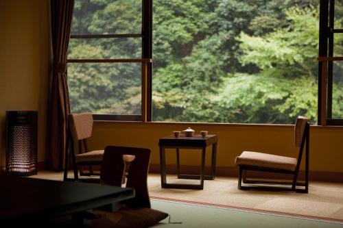 Gallery image of Hananosato Onsen Sansuikan in Takatuki