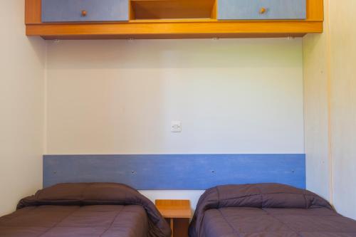 Postel nebo postele na pokoji v ubytování Càmping Terra Alta