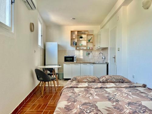 Køkken eller tekøkken på Studio Apartment