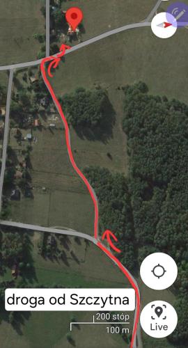 a map of a road with a red line at Mazurski Domek z Cegły nad Jeziorem in Sędańsk