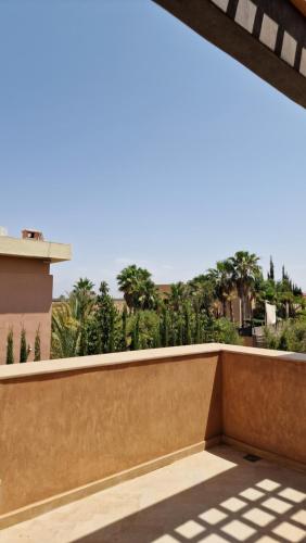 a view from the balcony of a house at Luxury Villa Private Pool Breakfast & Housekeeping in El Rhechat