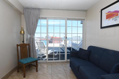 Χώρος καθιστικού στο Paradise Plaza Inn