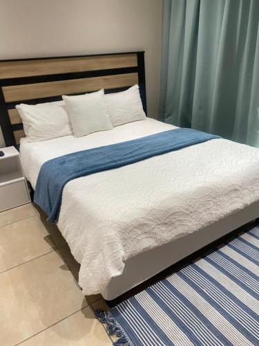 Ένα ή περισσότερα κρεβάτια σε δωμάτιο στο EThembeni Guesthouse