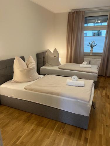 Postel nebo postele na pokoji v ubytování Ruhrperle Apartment 2 Essen