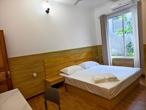 Postel nebo postele na pokoji v ubytování Eveylaa Guesthouse