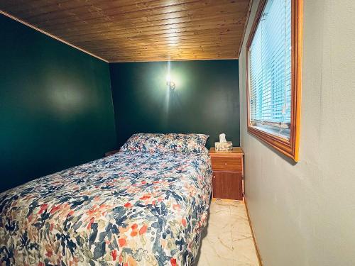 Ένα ή περισσότερα κρεβάτια σε δωμάτιο στο Chalet des Monk-bord de l'eau