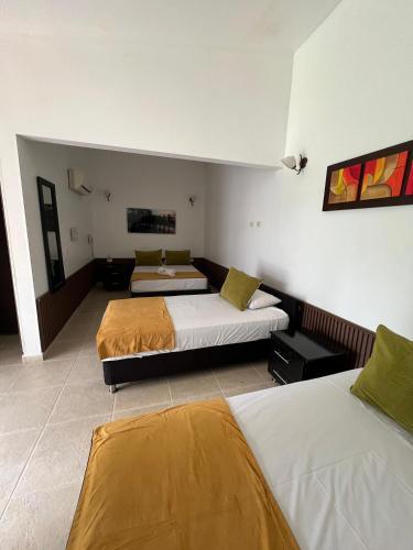 Ένα ή περισσότερα κρεβάτια σε δωμάτιο στο Hotel Boutique Duranta