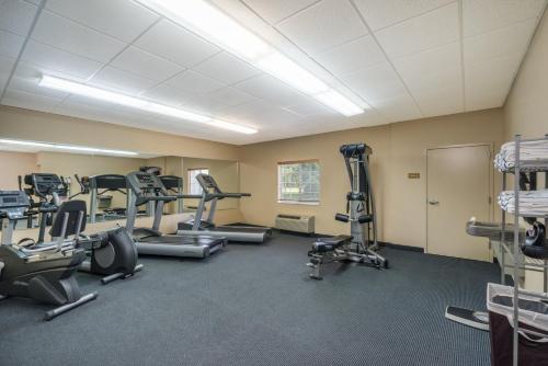 a gym with treadmills and elliptical machines at Candlewood Suites New Bern by IHG in New Bern