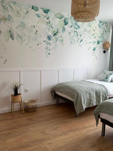Ένα ή περισσότερα κρεβάτια σε δωμάτιο στο Boho Przystań Mikołajki - Idealny dla Ciebie
